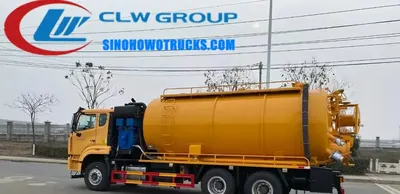 Rear view of the HOWO vacuum jetting truck showing hydraulic rear door and sewage discharge pipe