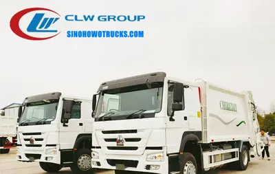 Rear view of the HOWO compactor truck showing hydraulic ram and sealed compaction chamber