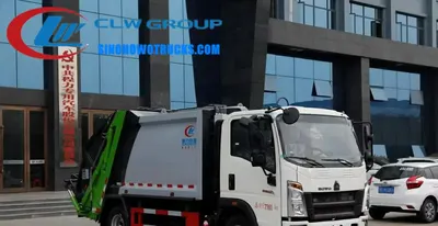 Side view of the HOWO compactor truck showing 4mm carbon steel body and sealed discharge system