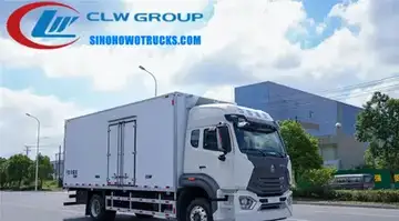 Sinotruk Hohan 15 ton refrigerated box truck in white with 'Sino Howo' logo on side, parked at a loading dock