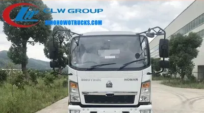Rear view of the 10 ton quarry dump truck with side lift mechanism and 12.00R20 tyres