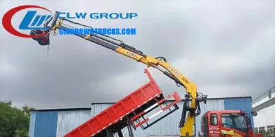 Side view of the knuckle boom crane showing hinge points and hydraulic cylinders