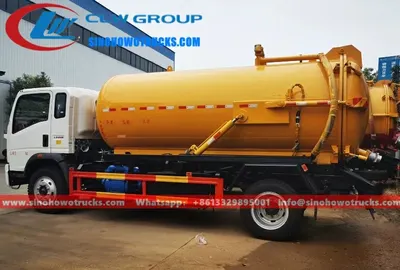 Sinotruk HOWO 4x2 sewage tanker truck in service with tank door open and suction hose extended
