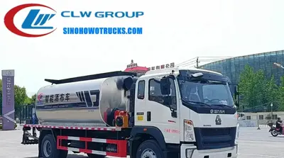 Rear view of the asphalt distributor with heat conduction oil system and automatic blowing device