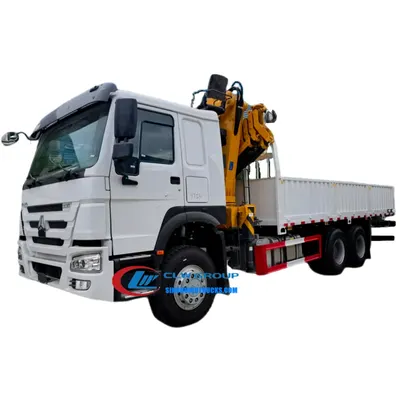 Sinotruk HOWO 6x4 self loader crane truck with telescopic boom in construction site environment