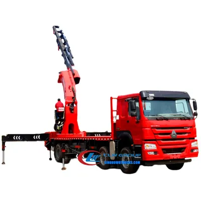 Rear view of the crane truck with the slewing mechanism and lifting winch visible