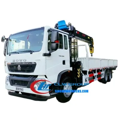 Rear view of the HOWO crane truck with the crane mounted on the chassis and hydraulic lines visible