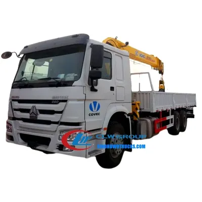 Rear view of the HOWO truck crane with the crane boom extended and hydraulic lines visible