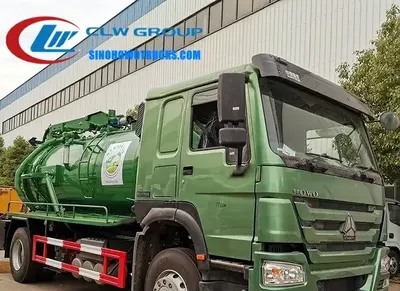 Rear view of the HOWO sewer jet truck showing vacuum pump, high-pressure pump, and rear hydraulic door