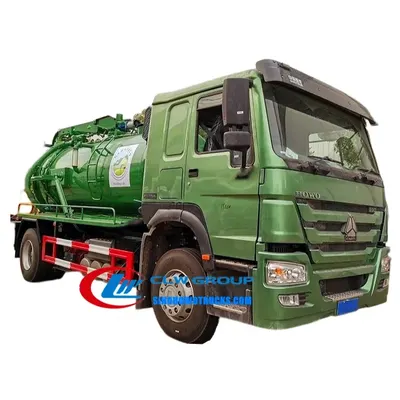 Sinotruk HOWO 4x2 sewer jet truck with 12000L tank and high-pressure hoses in urban maintenance setting