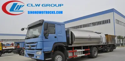 Side view of the HOWO asphalt spreader with adjustable spray width and heat conduction oil system