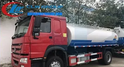 Side view of the HOWO septic truck showing the 6mm carbon steel tank and roller shutter access door