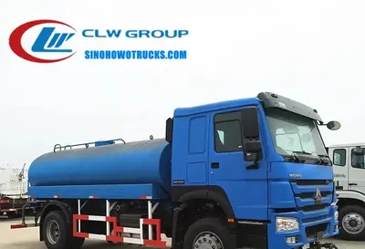 Side view of the HOWO water truck showing the tank, spray system, and 6x4 chassis