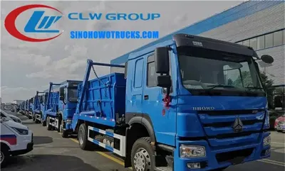 Side view of the HOWO skip loader truck showing the high strength steel swing arm and hydraulic system