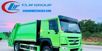 Rear loading arm and hydraulic system of the HOWO compactor truck in operation