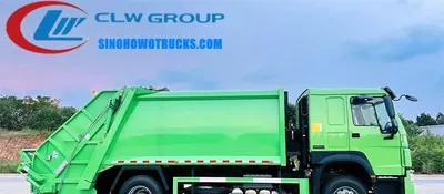 Sinotruk HOWO 12-ton rear loader garbage truck in urban waste collection service with compaction body and rear loading arm