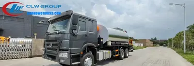 Rear view of the HOWO asphalt distributor showing the 14m3 tank and spray nozzles