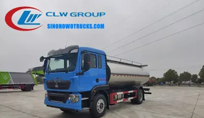 Sinotruk HOWO 4x2 dairy milk delivery truck in white with rear water cannon and front sprinklers