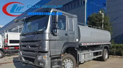 Rear view of the HOWO water truck showing high-pressure water cannon and working platform
