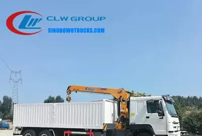 Sinotruk HOWO 15t service truck with crane in industrial grey with telescopic boom extended
