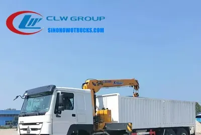 Rear view of the HOWO service truck with crane mounted on the cargo body