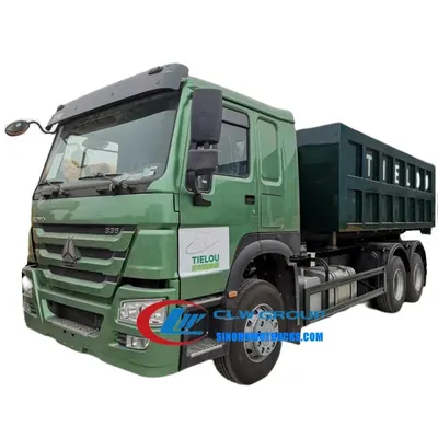 Side view of the roll off truck with 18m³ steel box and 10.00-20 tires