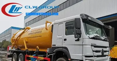 Sinotruk HOWO 16000 litre sewage water tanker in urban setting with rear tank cover open