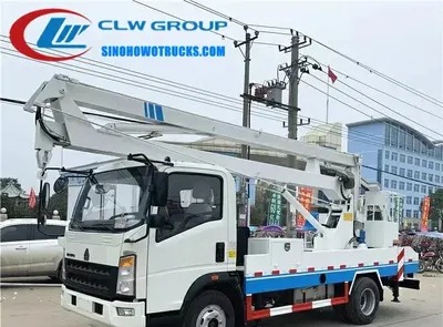 Side view of the HOWO man lift truck showing the telescopic boom and working platform