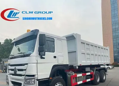 Side view of the HOWO roll off truck showing the 6x4 chassis and rear support device
