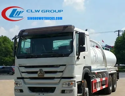 Sinotruk HOWO 18,000 litre septic tank truck in white with vacuum pump and suction tube at front