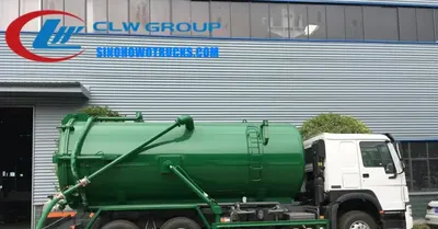 Rear view of the HOWO vacuum truck with fully open tailgate and pumping equipment