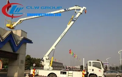 Front view of the HOWO boom lift with open work platform and safety guardrails
