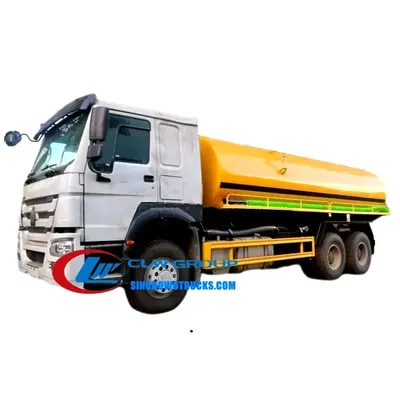 Rear view of the HOWO vacuum truck with the tank manhole and discharge valve