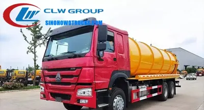 Sinotruk HOWO 23CBM sewage vacuum truck in service with tailgate fully open and suction hose deployed