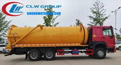 Side view of the HOWO sewage truck showing the 108mm inlet and hydraulic lift mechanism