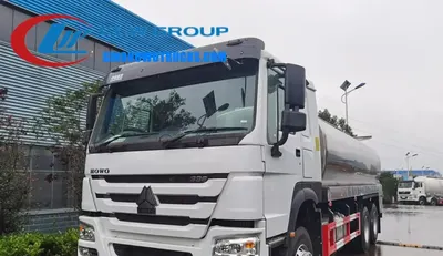 Rear view of the milk truck with CIP cleaning system access door and stainless steel piping