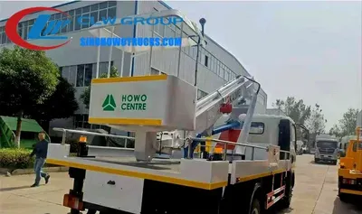 Front view of the truck with the boom fully extended and the platform at maximum height