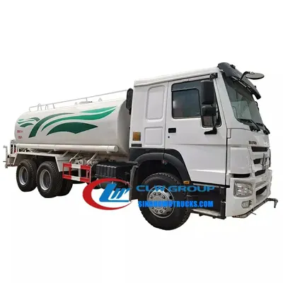 Sinotruk HOWO 6x4 construction water truck in red with 20m³ tank and green anti-aircraft gun mounted on the rear