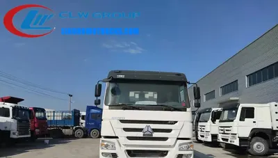 Rear view of the HOWO mining dump truck with open tipper body and rear axle housing