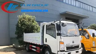 Side view of the HOWO dump truck showing the middle hydraulic double lifting mechanism and 7.00R16 tires