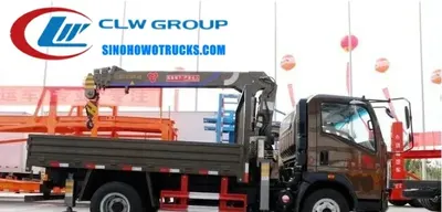 Side view of the HOWO truck crane showing the 360-degree rotating crane and compact design