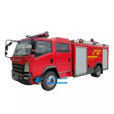 Rear pump room of the HOWO fire tender showing gauges, switches, and control panel
