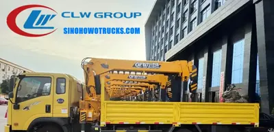 Side view of the 3t truck mounted crane showing the telescopic boom and drilling machine