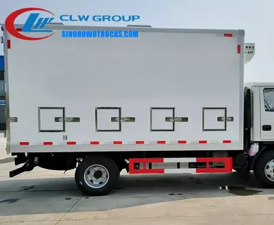 Side view of the HOWO chick transport truck showing 4 sets of sliding blind windows