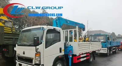 Side view of the HOWO mini crane truck showing the compact hinge point and high-strength steel frame