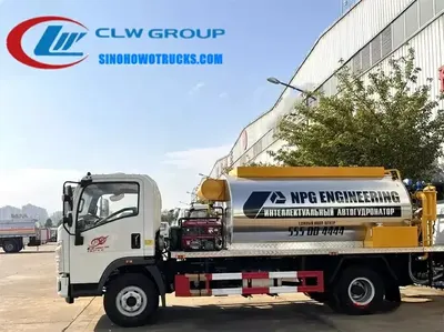 Sinotruk HOWO 4000 litre automatic asphalt sprayer truck in standard grey with computer-controlled spray system and rear platform