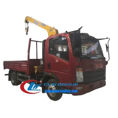 Side view of the truck crane with the boom extended and the operator using the top seat control