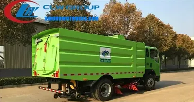 Rear view of the HOWO road sweeper with vacuum pump and spray nozzles visible