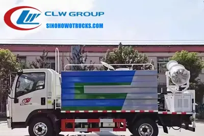Side view of the HOWO water tanker showing the 5000 L tank and rear working platform