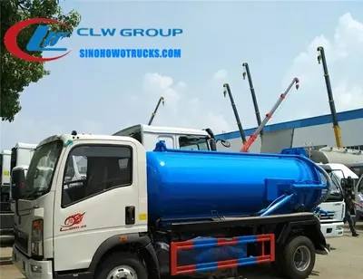 Rear view of the sewer truck with the openable rear cover and access door for cleaning and inspection